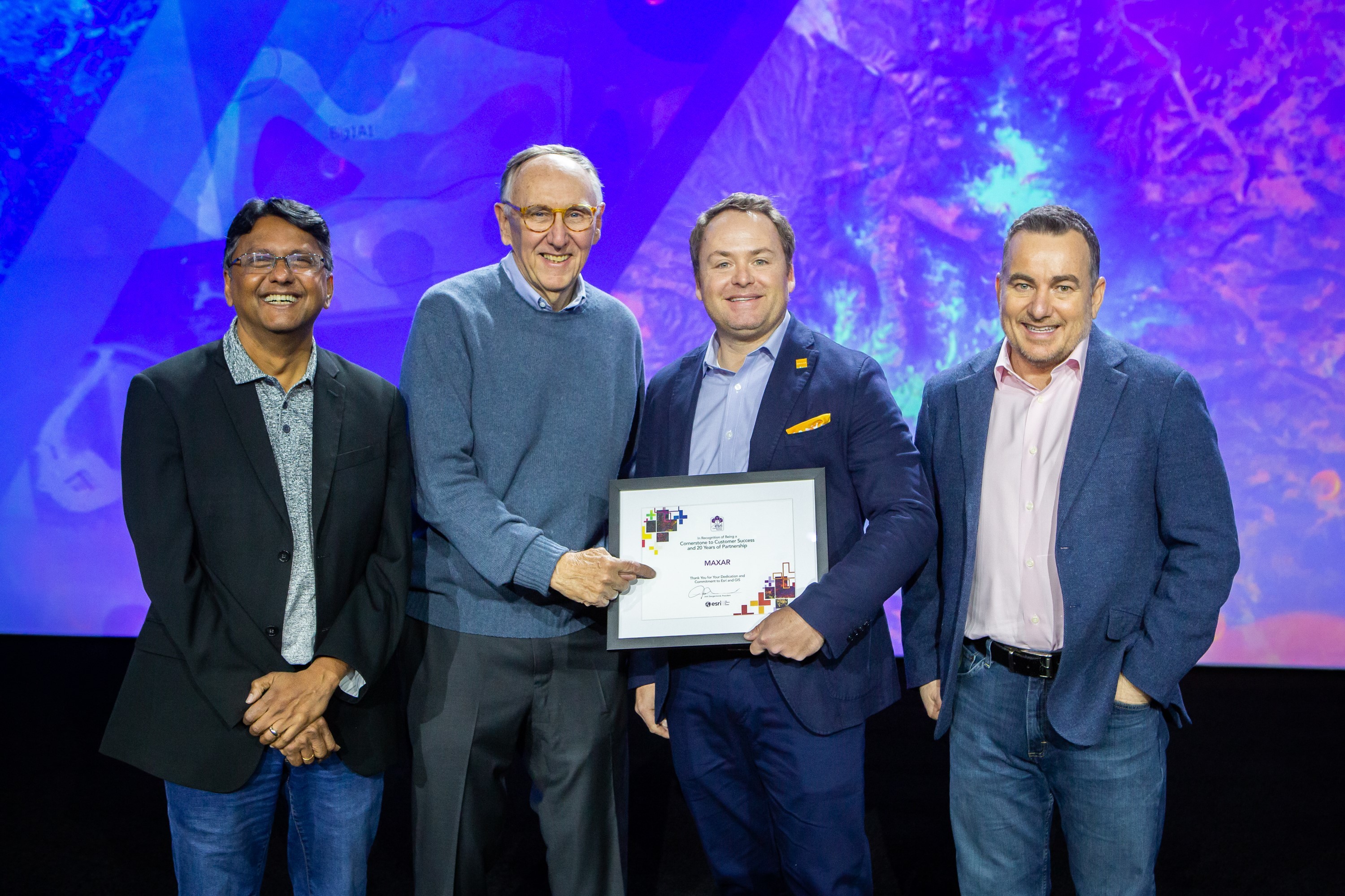 Maxar accepting 2020 Cornerstone Partner award from Esri